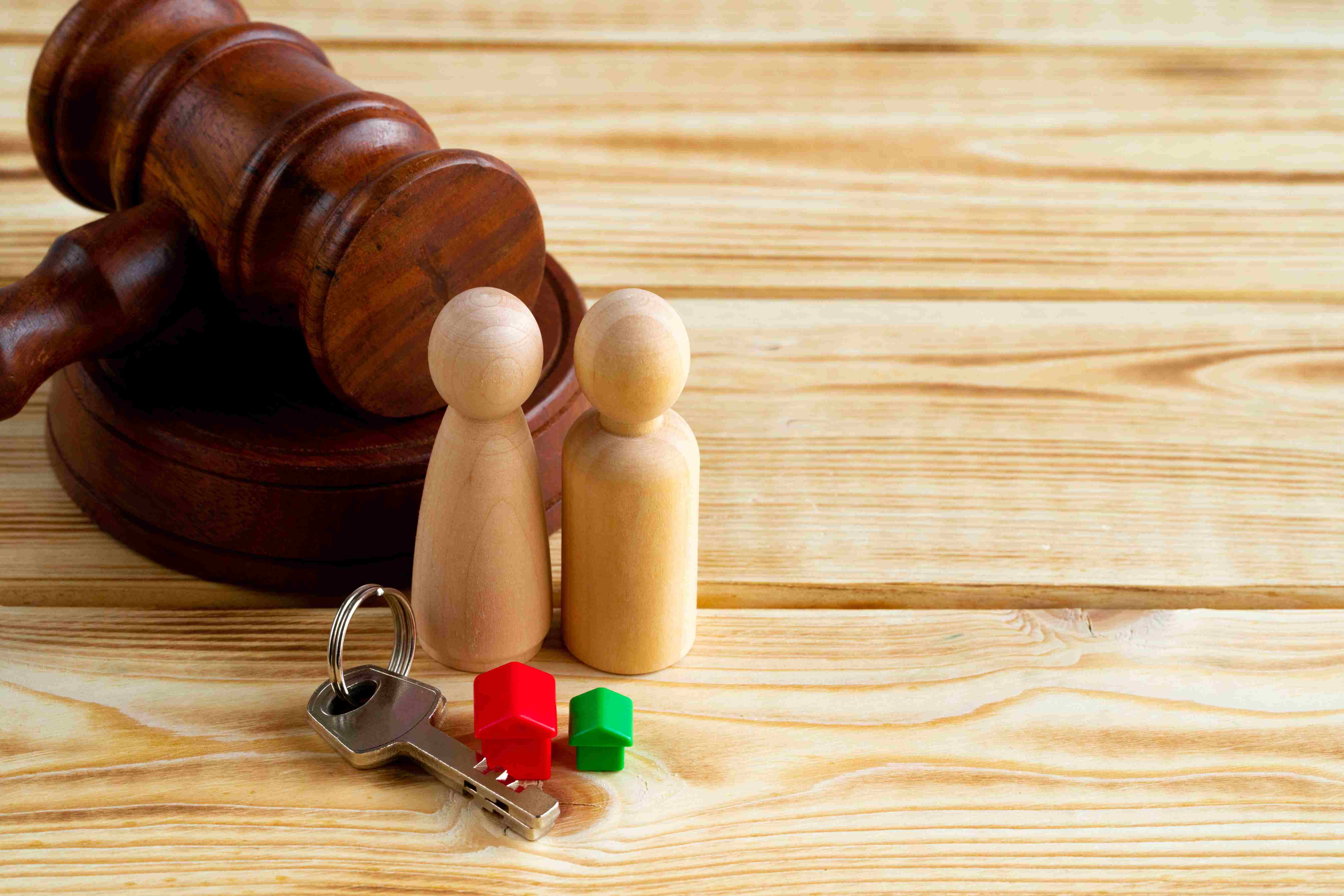 Figurines of a Couple infront of a gavel