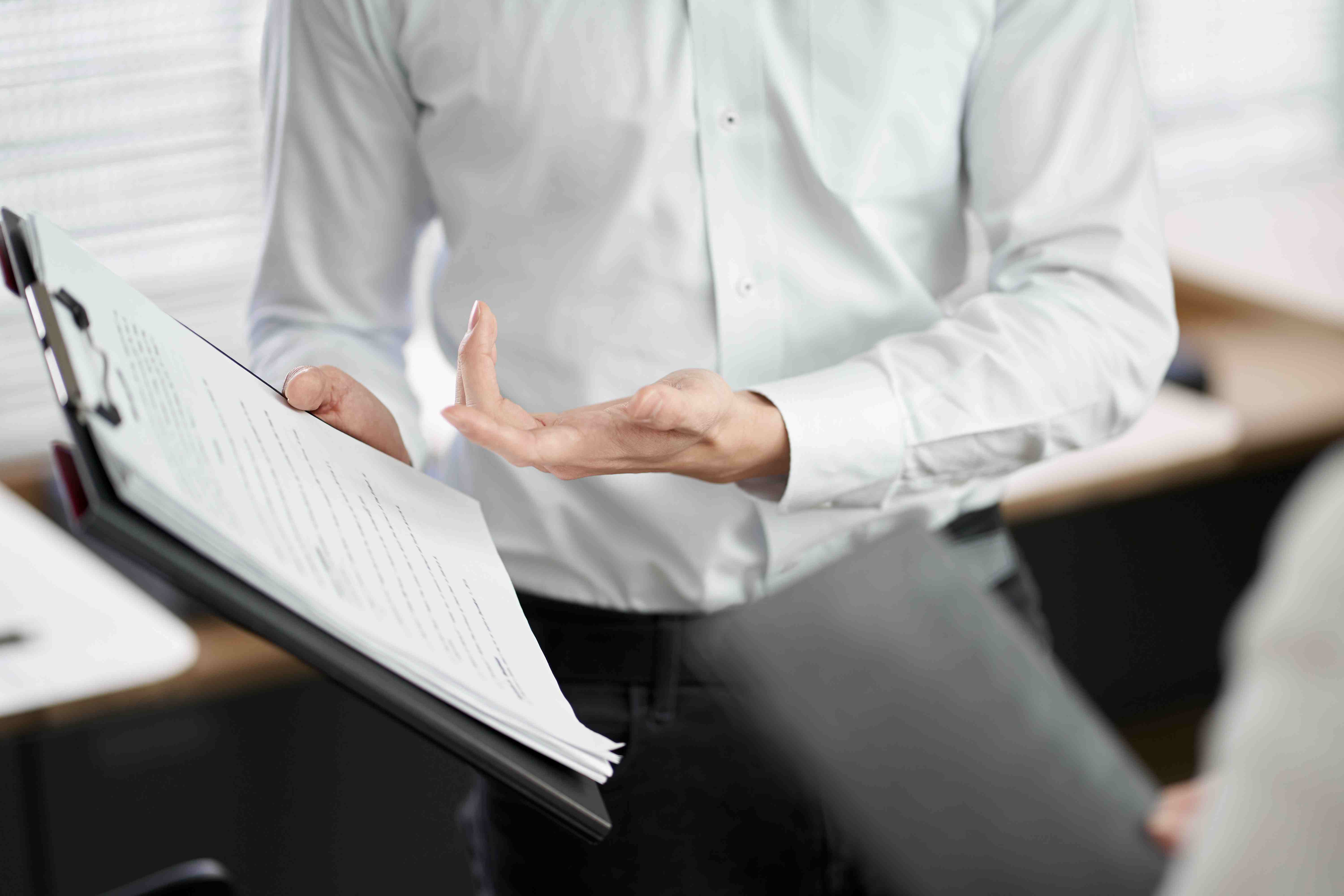 Man pointing at document