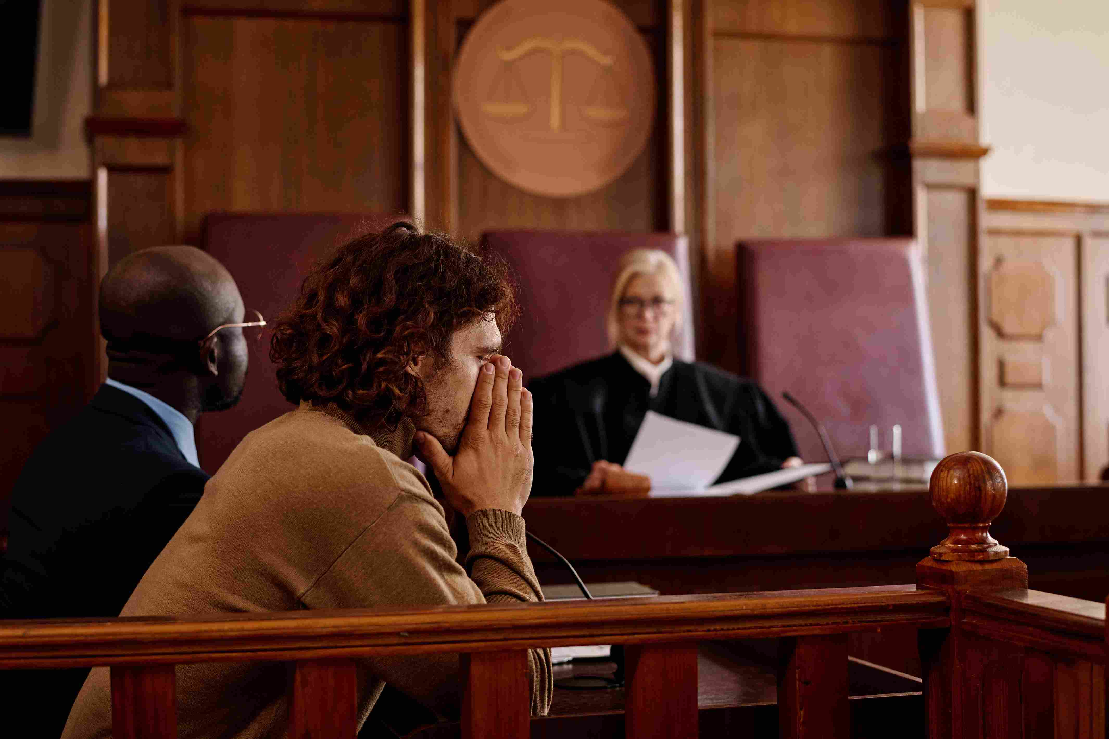 An anxious man in a courtroom